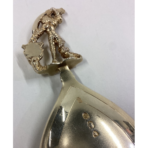 178 - A fine quality large heavy silver gilt spoon. London. By HF. Approx. 41 grams. Est. £30 - £50.