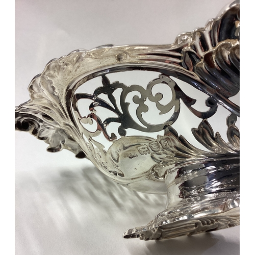 208 - A stylish silver sweet dish with scroll decoration. London. By JP. Approx. 115 grams. Est. £60 - £80... 