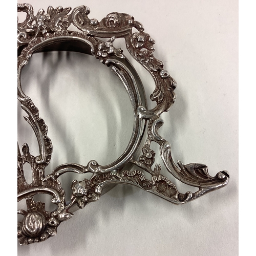 209 - A good quality cast silver double frame. London. By WC. Approx. 62 grams. Est. £50 - £80.