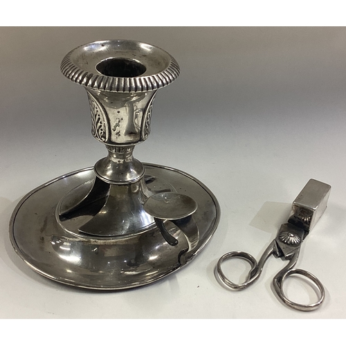 217 - A Continental silver chamberstick with snuffers. Circa 1800. Approx. 282 grams. Est. £200 - £300.