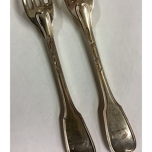 233 - A pair of 18th Century French silver forks. Circa 1780. Approx. 120 grams. Est. £100 - £150.