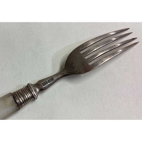 242 - WANG HING: A Chinese silver and MOP fork. Approx. 51 grams. Est. £60 - £80.