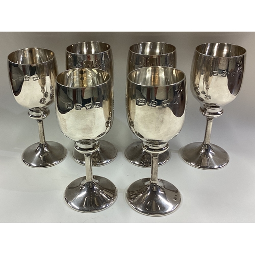 245 - A set of six silver goblets. Birmingham 1973. By RHV. Approx. 463 grams. Est. £500 - £800.