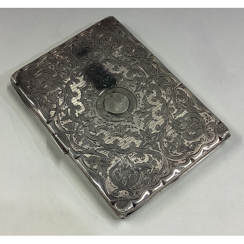 289 - An engraved Victorian silver card case with hinged cover. Birmingham 1868. By Deakin & Moore. Approx... 