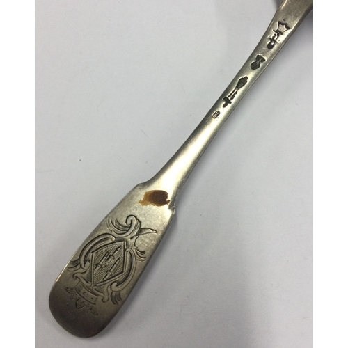 296 - An 18th Century French silver spoon with coat of arms to terminal. Approx. 21 grams. Est. £40 - £60.