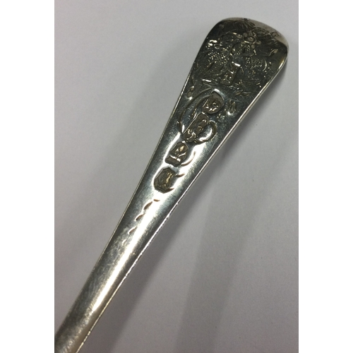 330 - An 18th Century silver berry sifter spoon. London 1725. Approx. 41 grams. Est. £60 - £80.