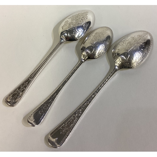 342 - A group of three bright-cut silver spoons. Various dates and makers. Approx. 118 grams. Est. £30 - £... 