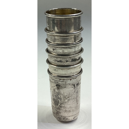 357 - A set of six Judaica silver stackable kiddush beakers. Marked to bases. Approx. 87 grams. Est. £100 ... 