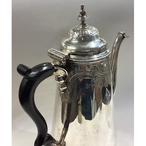 382 - An 18th Century George III silver coffee pot. London 1746. Approx. 754 grams. Est. £800 - £1200.