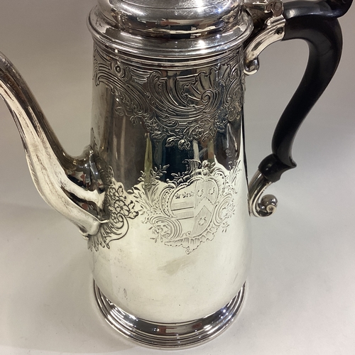 382 - An 18th Century George III silver coffee pot. London 1746. Approx. 754 grams. Est. £800 - £1200.