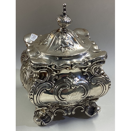 391 - A Victorian silver tea caddy with lift-off cover and chased decoration. Approx. 200 grams. Est. £200... 