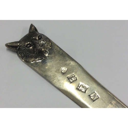 394 - A novelty silver letter opener with fox head decoration. Birmingham 1972. Approx. 47 grams. Est. £80... 