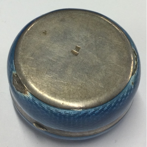 398 - A silver and blue enamelled pill box with hinged lid. Marked to base. Approx. 40 grams. Est. £50 - £... 