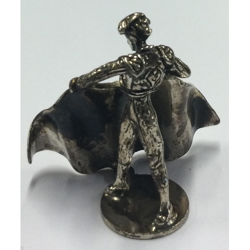 413 - A silver figure of a matador. Approx. 18 grams. Est. £20 - £30.