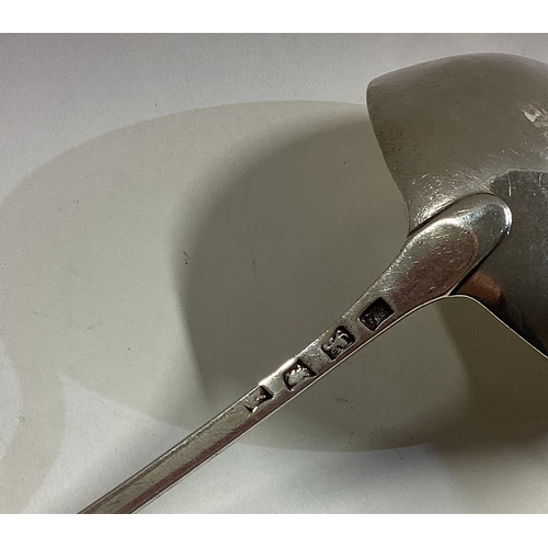 435 - An 18th Century silver bottom marked soup ladle. London 1764. Approx. 139 grams. Est. £120 - £150.