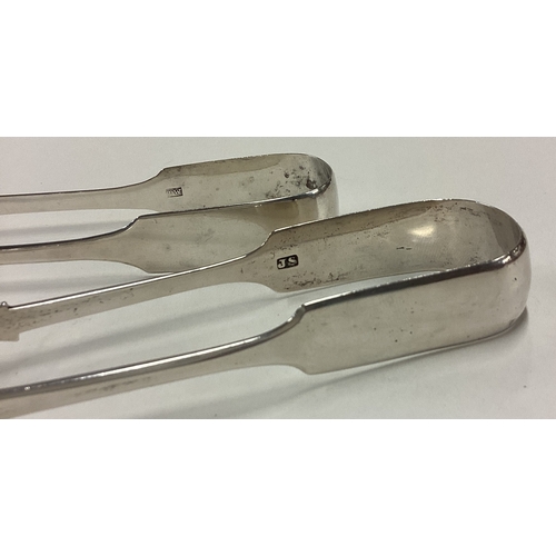 441 - EXETER: Two good pairs of silver fiddle pattern sugar tongs. Approx. 77 grams. Est. £25 - £30.