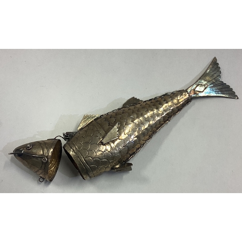 49 - An articulated silver figure of a fish. Approx. 51 grams. Est. £80 - £120.