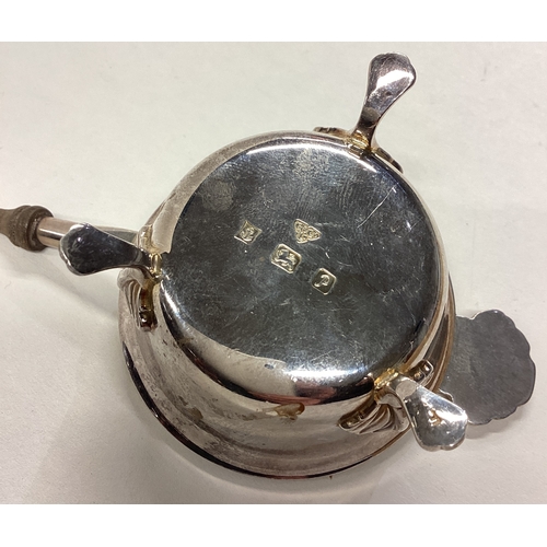 5 - A heavy modern silver tea strainer on stand. Birmingham. Approx. 91 grams. Est. £30 - £40.