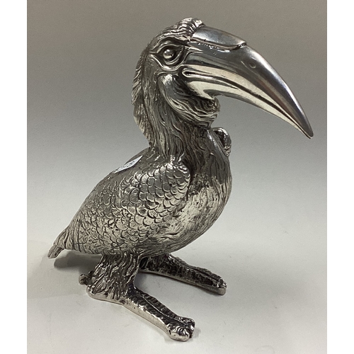 518 - A rare silver figure of a toucan. Marked to base. Approx. 419 grams. Est. £300 - £400.