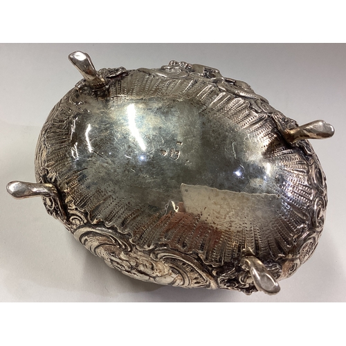 527 - A Dutch silver basket with embossed decoration. Marked to base. Approx. 138 grams. Est. £120 - £150.