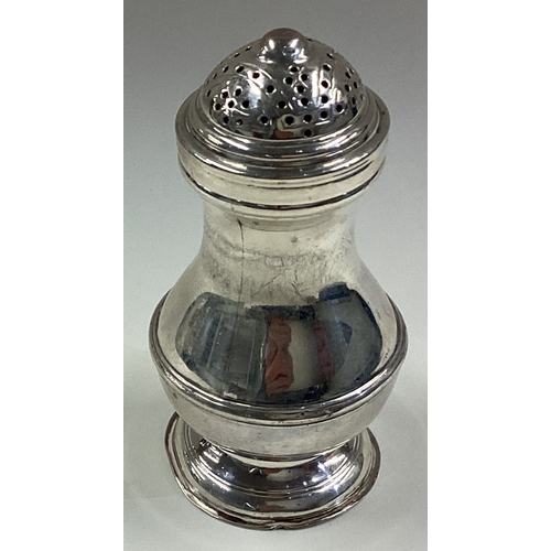 584 - An 18th Century silver muffineer. Circa 1750. Approx. 68 grams. Est. £80 - £120.