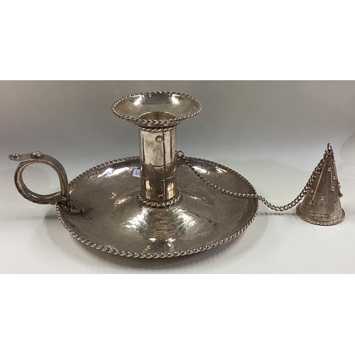 639 - An unusual silver chamberstick. London 1991. By Michael Bolton. Approx. 478 grams. Est. £800 - £1200... 