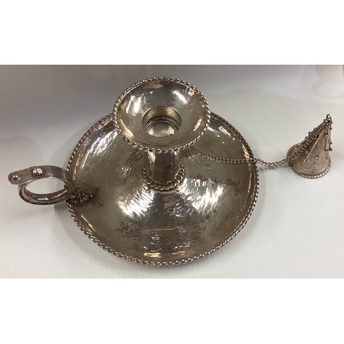 639 - An unusual silver chamberstick. London 1991. By Michael Bolton. Approx. 478 grams. Est. £800 - £1200... 