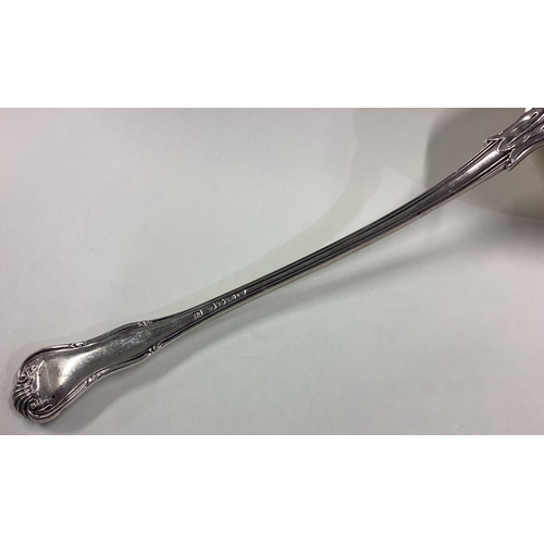 641 - A silver King's husk pattern soup ladle. London 1855. Approx. 243 grams. Est. £200 - £300.