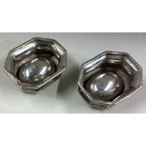 643 - A pair of Queen Anne silver trencher salts. Approx. 128 grams. Est. £200 - £300.