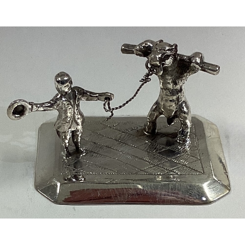 664 - An Antique Dutch silver table toy. Marked to base. Approx. 36 grams. Est. £40 - £60.