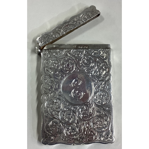 711 - CHESTER: A good engraved silver card case with scroll decoration. Approx. 54 grams. Est. £80 - £120.