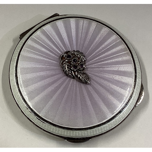 718 - A silver and enamelled compact. Birmingham 1961. By HCD. Approx. 129 grams. Est. £200 - £300.