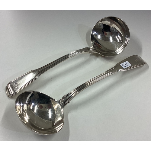 723 - A heavy pair of silver fiddle and thread pattern ladles. London. By Eley & Fearn. Approx. 124 grams.... 