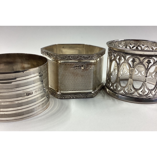 737 - A good group of three cased silver napkin rings. Various dates and makers. Approx. 90 grams. Est. £2... 