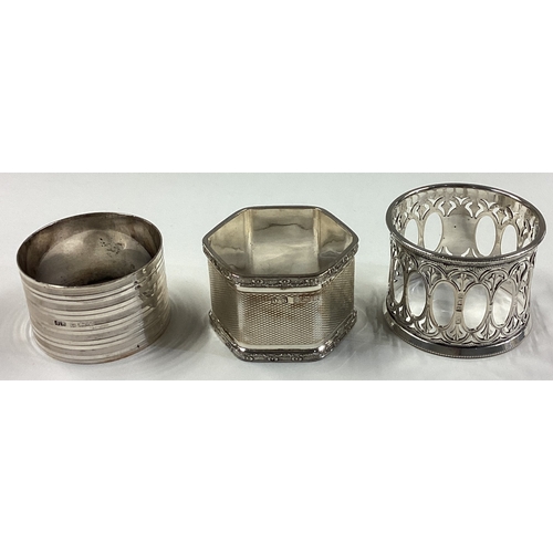 737 - A good group of three cased silver napkin rings. Various dates and makers. Approx. 90 grams. Est. £2... 