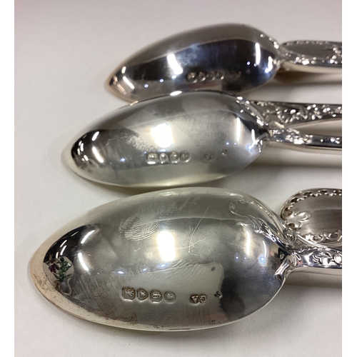 739 - A good set of six cast silver dessert spoons with crested terminals. London. By George Adams. Approx... 