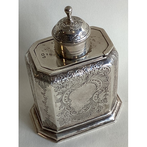 747 - A good quality chased silver tea caddy with sliding top. London. By GU. Approx. 152 grams. Est. £120... 