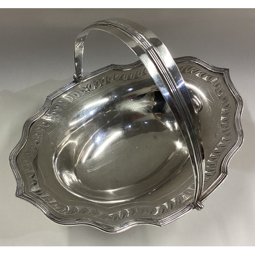 750 - A Georgian silver swing handled basket with bright-cut decoration. London 1798. Approx. 172 grams. E... 