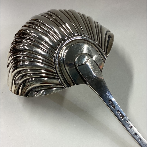 762 - A good Georgian silver OE pattern ladle with fluted bowl. London. By TE. Approx. 164 grams. Est. £10... 