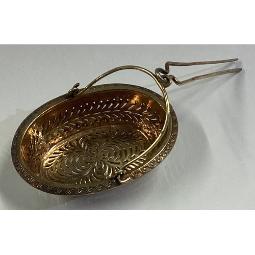 769 - A 19th Century French silver gilt tea strainer / infuser. Marked to side. Approx. 28 grams. Est. £60... 