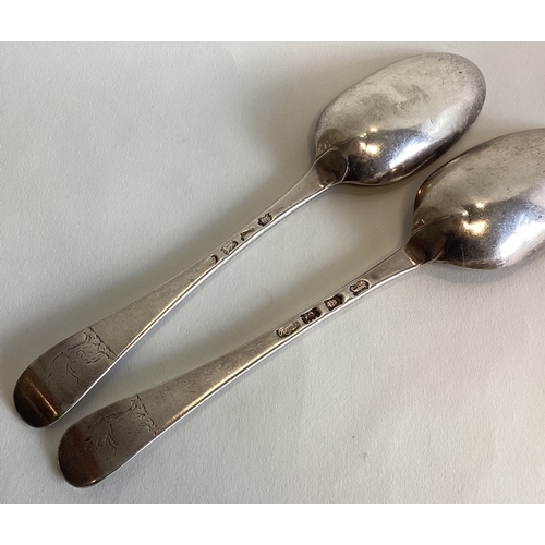 770 - A good silver OE pattern tablespoon with crested terminal together with another similar example. Lon... 