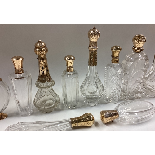 79 - A large collection of Antique Dutch gold mounted scent bottles. Est. £500 - £800.