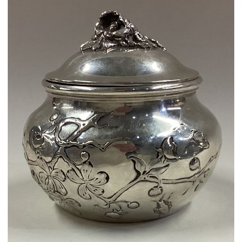 85 - A 19th Century Continental silver tea caddy with chased decoration. Approx. 118 grams. Est. £120 - £... 