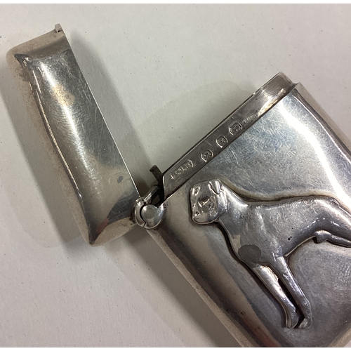 145 - An unusual silver hinged top vesta case mounted with a Boxer dog. Birmingham. Approx. 13 grams. Est.... 