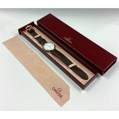 862 - OMEGA: A gent's slim wristwatch in fitted box. Est. £100 - £150.