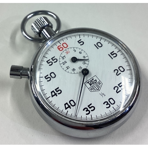 864 - TAG HEUER: A stopwatch. Est. £40 - £60.