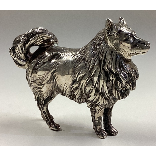 517 - A fine silver figure of a dog with textured decoration bearing import marks. London 1903. Approx. 15... 