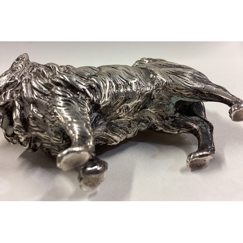 517 - A fine silver figure of a dog with textured decoration bearing import marks. London 1903. Approx. 15... 