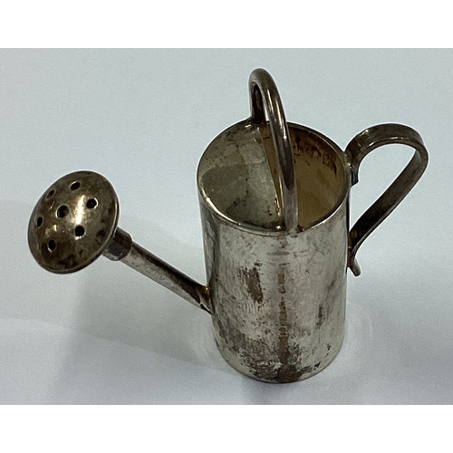 568 - A rare silver toy model of a watering can. Approx. 29 grams. Est. £40 - £60.