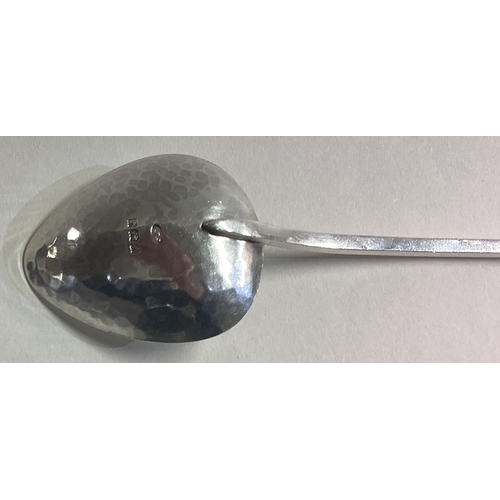 738 - A E JONES: A stylish silver preserve spoon with ball decoration. Birmingham. Approx. 27 grams. Est. ... 